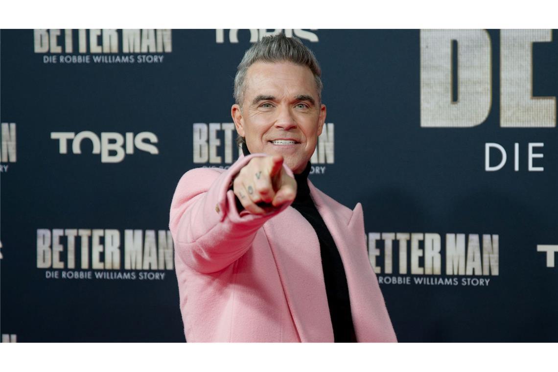 Kommt 2025 mit Konzerten nach Deutschland: Superstar Robbie Williams. (Archivbild)